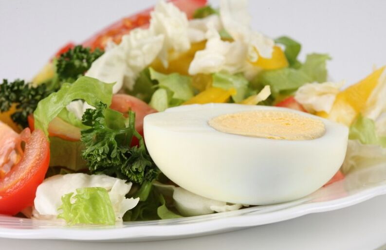 Fresh vegetable salad with boiled eggs on Maggi's diet menu