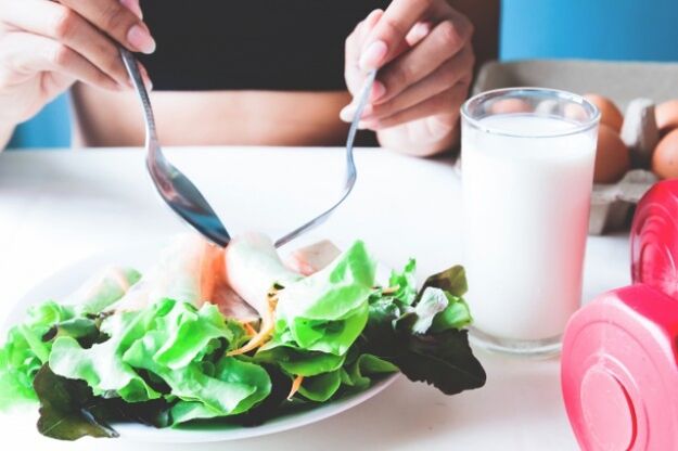 Salads and a glass of yogurt